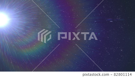 Glowing white spot of light flickering against blue background 82801114