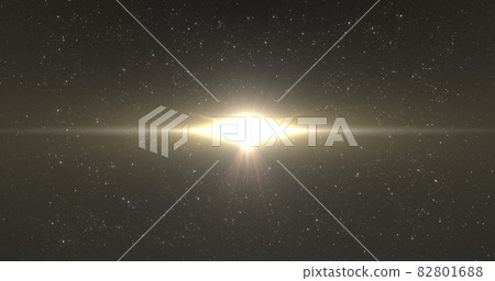 Bright golden spot of light glowing in the night sky Bright golden spot of light glowing in the night sky 82801688