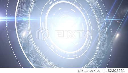 Image of spinning circles with glowing circuit board over glowing background Image of spinning circles with glowing circuit board over glowing background 82802231