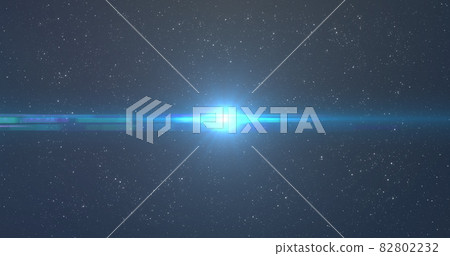 Bright blue spot of light glowing in the night sky Bright blue spot of light glowing in the night sky 82802232