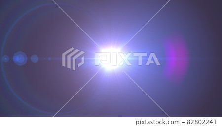 Bright blue spot of light glowing against blue background Bright blue spot of light glowing against blue background 82802241