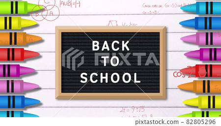 Back To School text against crayons and mathematical equations 82805296