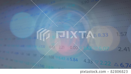 Spots of light and multiple changing numbers against stock market data processing 82806823