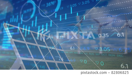 Financial data processing against solar panel and windmill in background 82806825