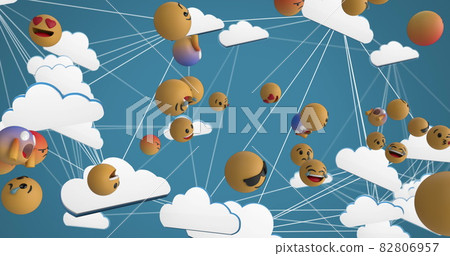 Multiple face emojis floating against network of cloud icons against blue background 82806957