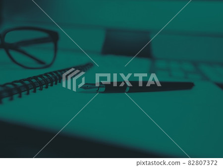 Composition of close up of notebook and pen on table Composition of close up of notebook and pen on table 82807372