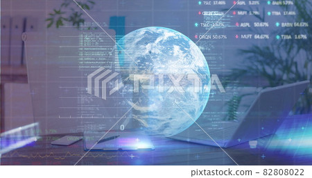 Digital composite image of stock market data processing over globe against office desk 82808022