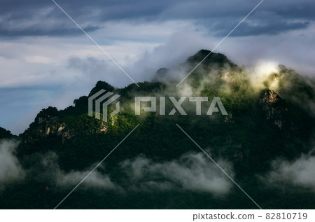 Morning with fog above the mountain, 82810719