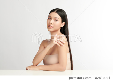 Beautiful young asian woman with clean fresh skin on white background, Face care, Facial treatment, Beautiful young asian woman with clean fresh skin on white background, Face care, Facial treatment, 82810921
