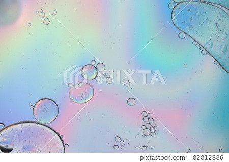 Holographic colorful abstract background with oil drops on water 82812886