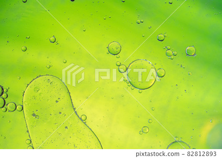 Green and yellow abstract background picture made with oil, water and soap Green and yellow abstract background picture made with oil, water and soap 82812893