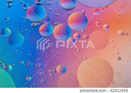 Orange and blue abstract background picture made with oil, water and soap Orange and blue abstract background picture made with oil, water and soap 82812950