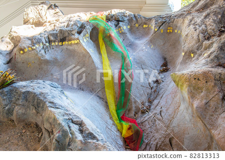 The mystery Buddha footprints in Wat Chaloem Phra Kiat temple in Lampang province of Thailand. Those footprints have been being respected by villagers in Chae Hom County all long. 82813313