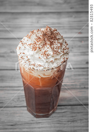 Coffee with Ice cream, milk and chocolate on abstract background. Coffee with Ice cream, milk and chocolate on abstract background. 82815493