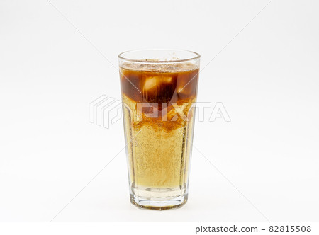Iced coffee with juice isolated white background. 82815508