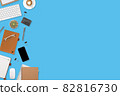 flat lay workspace table with laptop computer, office supplies, coffee cup, tablet and cell phone on blue pastel background 82816730