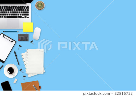 flat lay workspace table with laptop computer, office supplies, coffee cup, tablet and cell phone on blue pastel background flat lay workspace table with laptop computer, office supplies, coffee cup, tablet and cell phone on blue pastel background 82816732