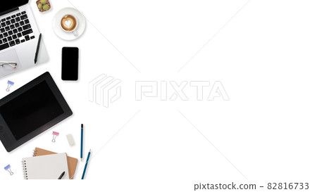 flat lay workspace table with laptop computer, office supplies, coffee cup, tablet and cell phone on white background flat lay workspace table with laptop computer, office supplies, coffee cup, tablet and cell phone on white background 82816733