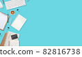 flat lay workspace table with laptop computer, office supplies, coffee cup, tablet and cell phone on green pastel background 82816738