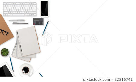 flat lay workspace table with laptop computer, office supplies, coffee cup, tablet and cell phone on white background flat lay workspace table with laptop computer, office supplies, coffee cup, tablet and cell phone on white background 82816741