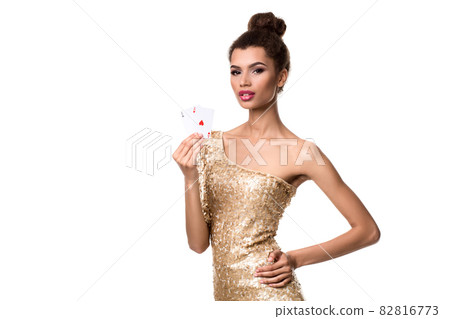 Beautiful young woman holding two ace of cards in her hand isolated on white Beautiful young woman holding two ace of cards in her hand isolated on white 82816773