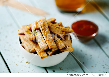 mock chicken strips and ketchup 82818963