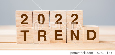 2022 TREND cube block on table background. Resolution, plan, review, change, start and New Year holiday concepts 82822173