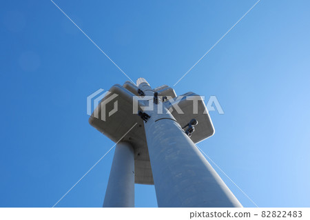 Zizkov television tower against the blue sky. View from below. Zizkov television tower against the blue sky. View from below. 82822483