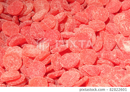 A pile of pink marmalade as a background. Candy close-up. 82822601