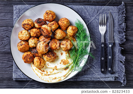 Keftedakia, fried greek meatballs on a plate 82823433
