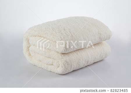 Soft and warm of white folded blanket isolated on white 82823485
