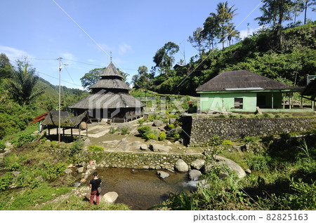 WEST SUMATERA, INDONESIA -JUNE 8, 2014: Tuo Kayu Jao Mosque is located in West Sumatra, Indonesia. Built in 1599 and is the second oldest mosque in Indonesia. WEST SUMATERA, INDONESIA -JUNE 8, 2014: Tuo Kayu Jao Mosque is located in West Sumatra, Indonesia. Built in 1599 and is the second oldest mosque in Indonesia. 82825163