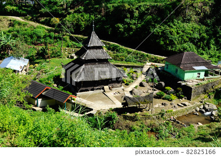 WEST SUMATERA, INDONESIA -JUNE 8, 2014: Tuo Kayu Jao Mosque is located in West Sumatra, Indonesia. Built in 1599 and is the second oldest mosque in Indonesia. 82825166