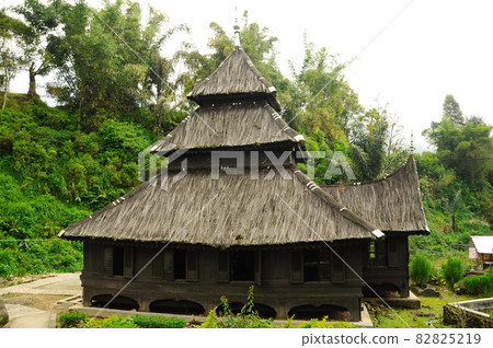 WEST SUMATERA, INDONESIA -JUNE 8, 2014: Tuo Kayu Jao Mosque is located in West Sumatra, Indonesia. Built in 1599 and is the second oldest mosque in Indonesia. WEST SUMATERA, INDONESIA -JUNE 8, 2014: Tuo Kayu Jao Mosque is located in West Sumatra, Indonesia. Built in 1599 and is the second oldest mosque in Indonesia. 82825219