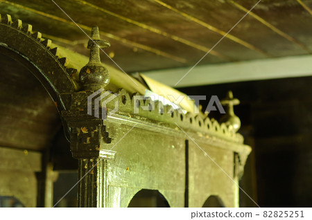 WEST SUMATERA, INDONESIA -JUNE 8, 2014: Architectural detail and wood craft at Tuo Kayu Jao Mosque in West Sumatra, Indonesia. Built in 1599 and is the second oldest mosque in Indonesia. 82825251