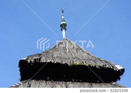 WEST SUMATERA, INDONESIA -JUNE 8, 2014: Roof structure detail of Tuo Kayu Jao Mosque in West Sumatra, Indonesia. Built in 1599 and is the second oldest mosque in Indonesia. WEST SUMATERA, INDONESIA -JUNE 8, 2014: Roof structure detail of Tuo Kayu Jao Mosque in West Sumatra, Indonesia. Built in 1599 and is the second oldest mosque in Indonesia. 82825298