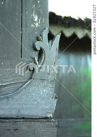 WEST SUMATERA, INDONESIA -JUNE 8, 2014: Architectural detail and wood craft at Tuo Kayu Jao Mosque in West Sumatra, Indonesia. Built in 1599 and is the second oldest mosque in Indonesia. WEST SUMATERA, INDONESIA -JUNE 8, 2014: Architectural detail and wood craft at Tuo Kayu Jao Mosque in West Sumatra, Indonesia. Built in 1599 and is the second oldest mosque in Indonesia. 82825327