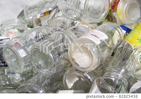 Glass jars collected for recycling. Environmental protection. Glass jars collected for recycling. Environmental protection. 82825438