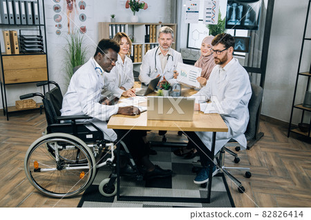Diverse medical workers having video conference on laptop 82826414