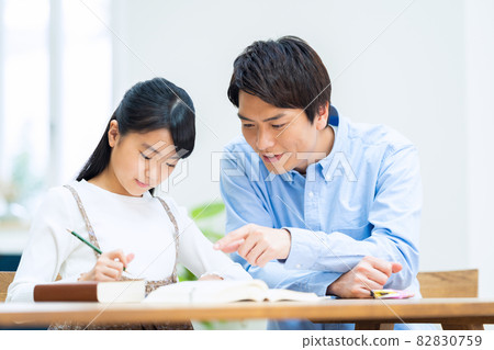 Elementary school children, women, study, examination, education, learning Elementary school children, women, study, examination, education, learning 82830759