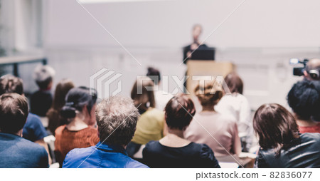 Woman giving presentation on business conference event. 82836077