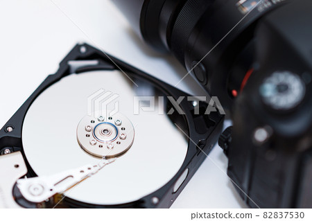 Hard disk camera backup [photographer image] 82837530