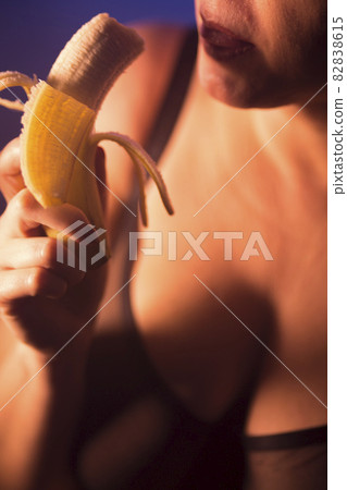 Sexy erotic lady eating banana Sexy erotic lady eating banana 82838615
