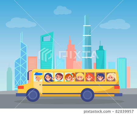 School Bus Full of Children Drives Through City 82839957