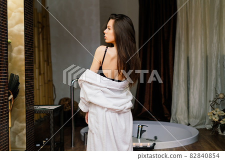 Woman having massage of body in the spa salon. Beauty treatment concept. Woman having massage of body in the spa salon. Beauty treatment concept. 82840854