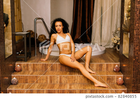 Woman having massage of body in the spa salon. Beauty treatment concept. Woman having massage of body in the spa salon. Beauty treatment concept. 82840855