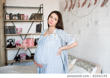 Young pregnant woman feeling bad at home. 82842145