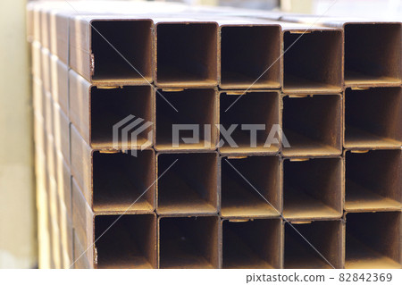 Metal profile pipe of rectangular cross section in packs at the warehouse of metal products 82842369