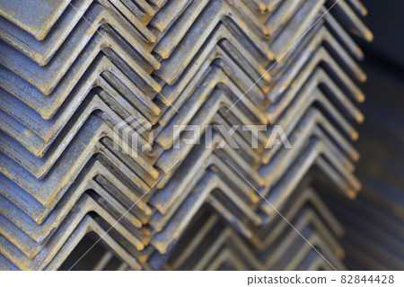 Metal profile angle in packs at the warehouse of metal products Metal profile angle in packs at the warehouse of metal products 82844428