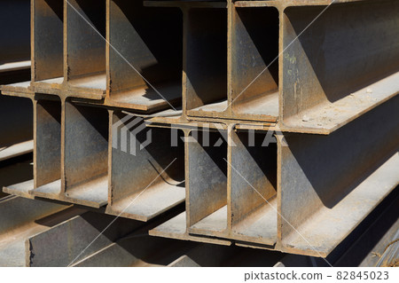 Metal profile beam in packs at the warehouse of metal products Metal profile beam in packs at the warehouse of metal products 82845023